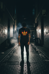 Black tee worn urban night